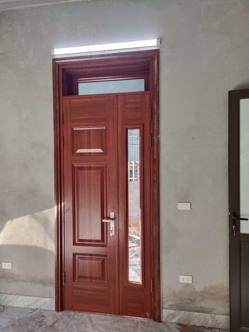 Cửa thép vân gỗ tại Bình Chánh